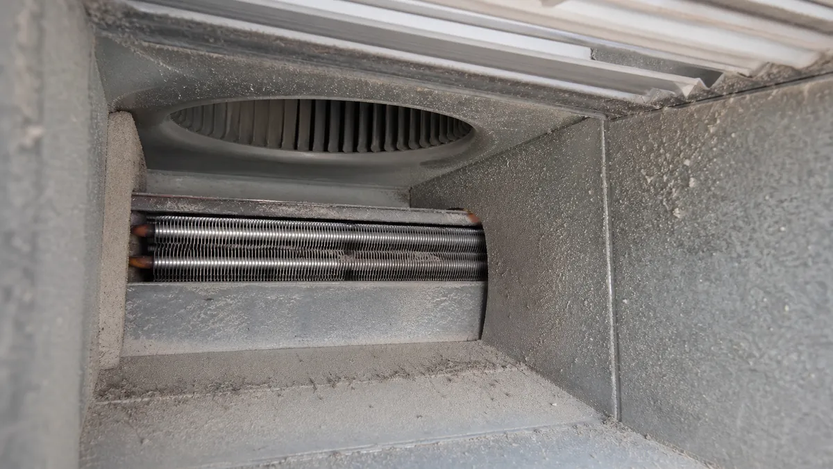 Where dust collects inside an HVAC duct system